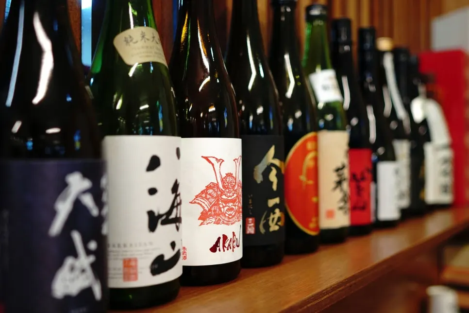 Drink menu listing soju, beer, and sake