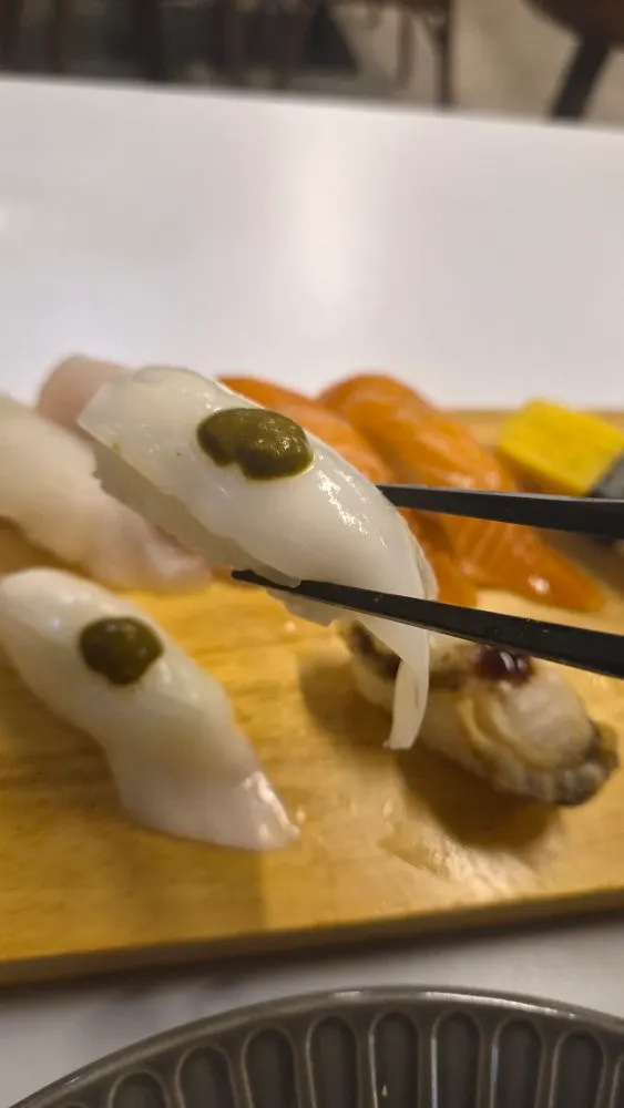 Sushi served with soy sauce and fresh wasabi