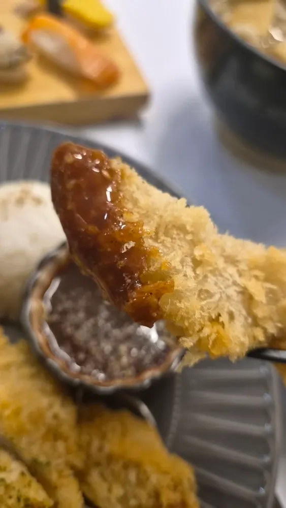 Cross-section of tonkatsu showing the breading