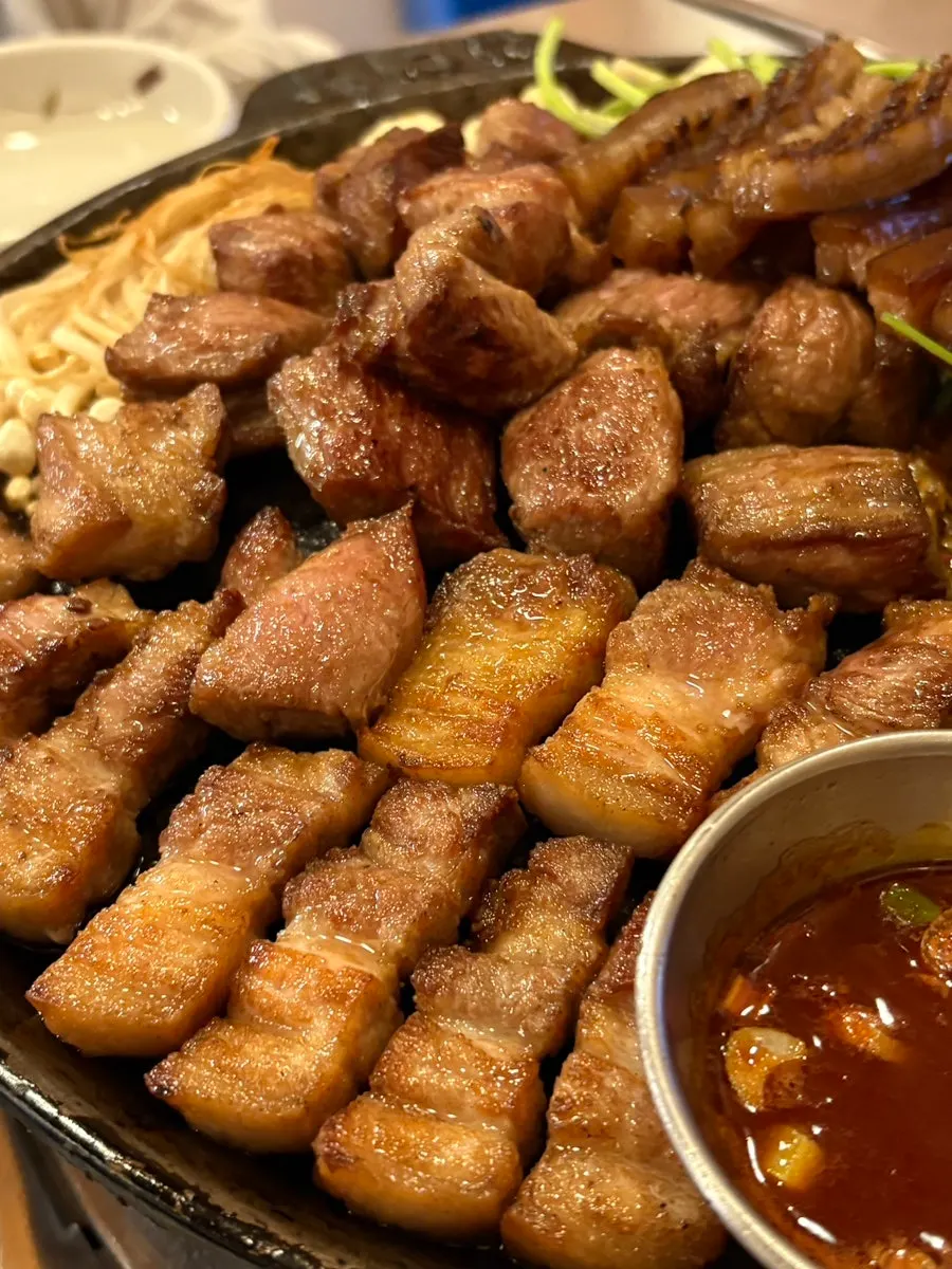 Grilled pork belly and pork neck on the stone plate