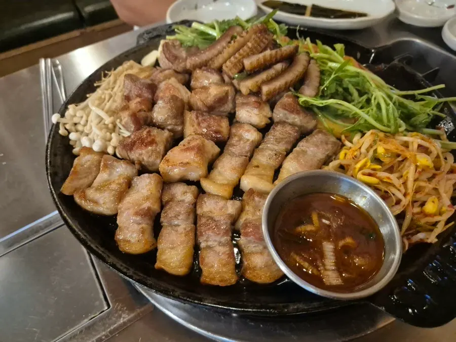 Side dish plate served alongside cold noodle broth