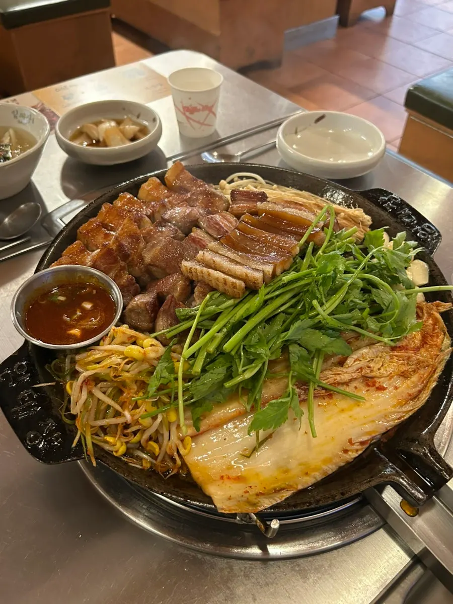 Plates of side dishes to eat with the meat