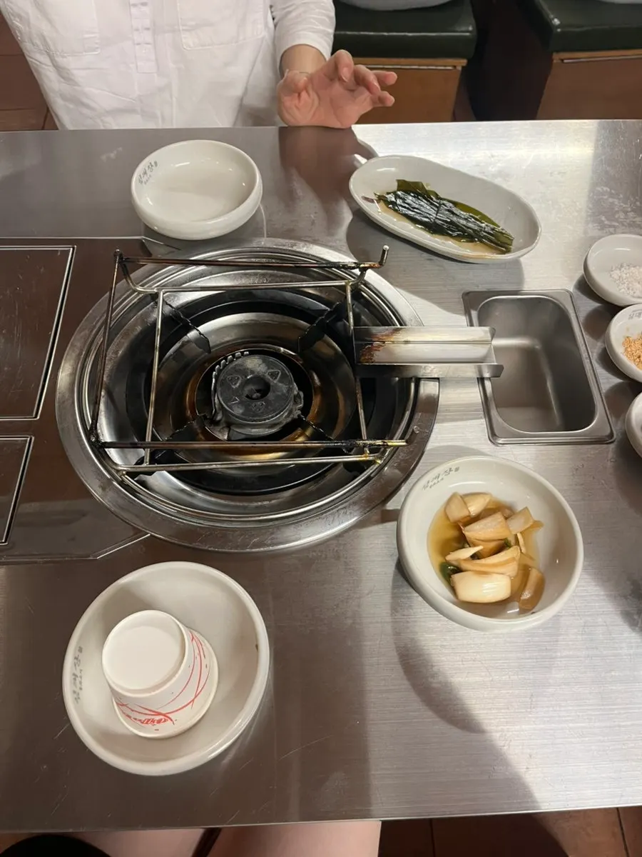 Side dishes pre-set at a reserved table