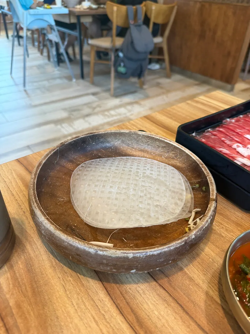Rice paper sheets served alongside the vegetables