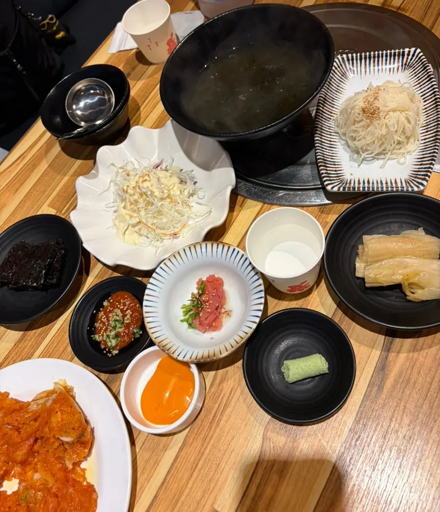Seaweed soup and salad served as side dishes