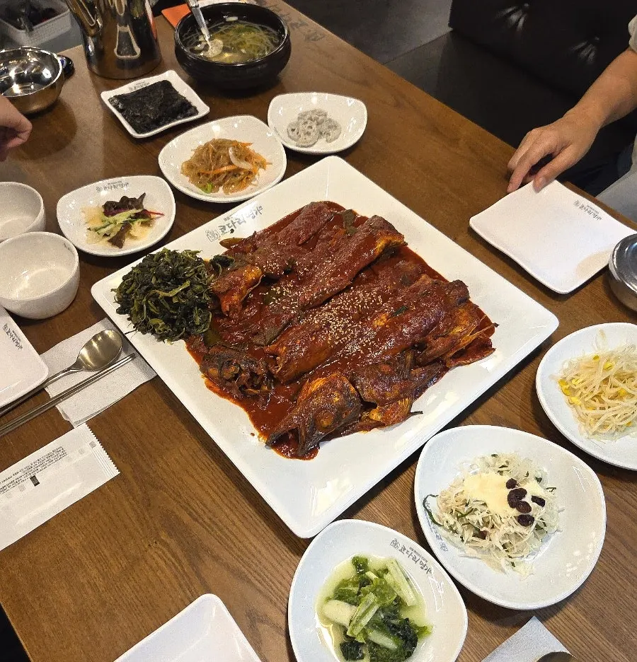 Entrance and tidy interior of the Korean restaurant inside the building