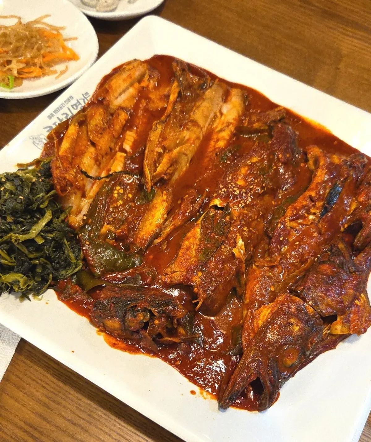 Main plate of spicy siraegi pollock stew for 3 topped with siraegi