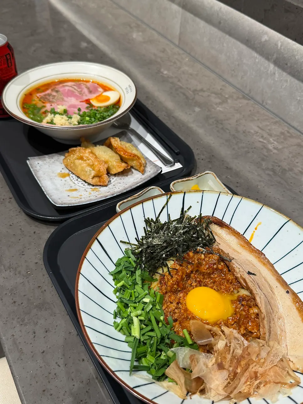 Pork belly mazemen with a raw egg