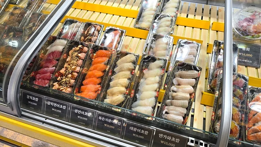 Display of various sushi types at Minyeong Hwareo Gongjang