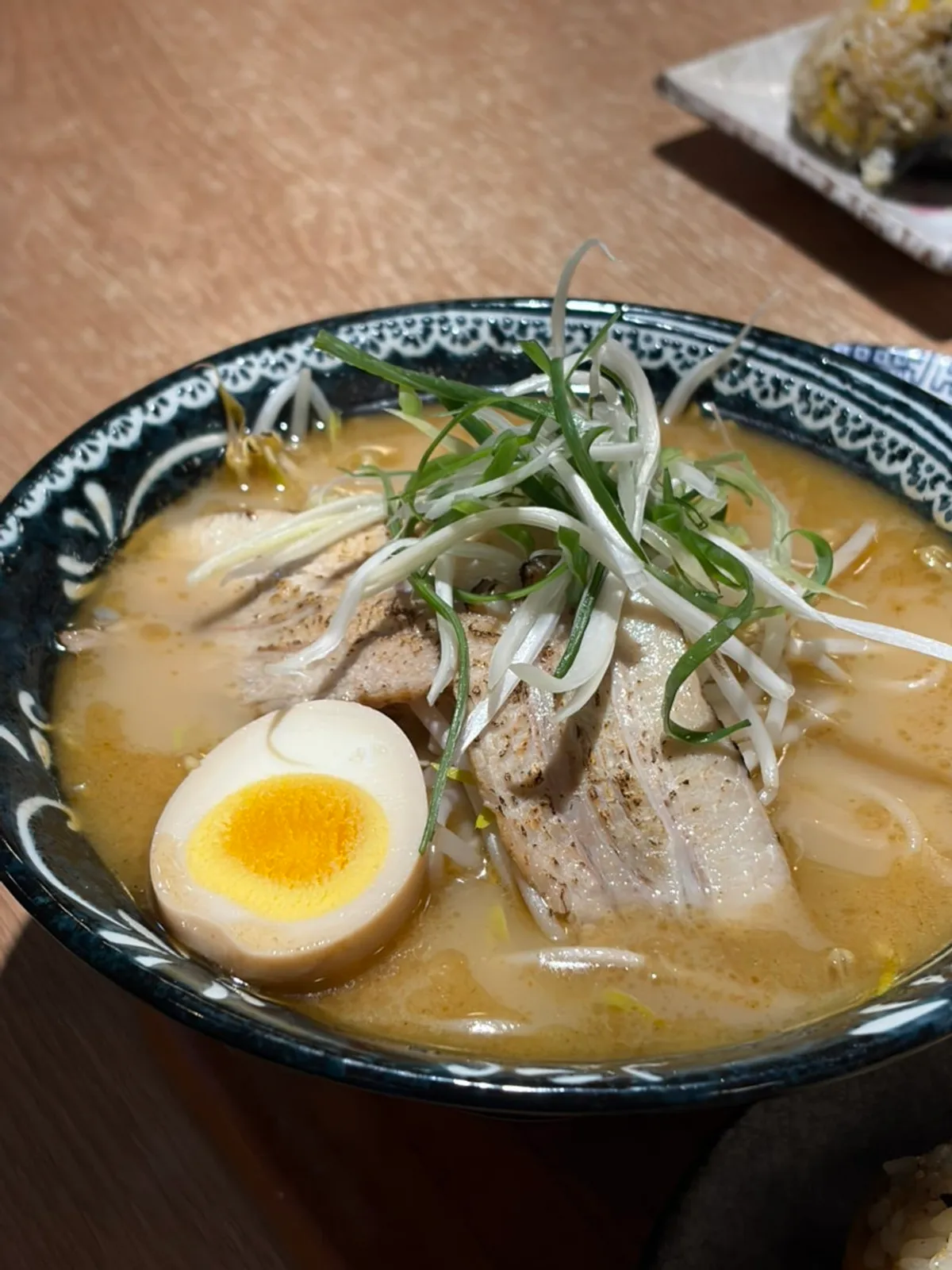 Fukuoka-style tonkotsu ramen topped with chashu and bean sprouts