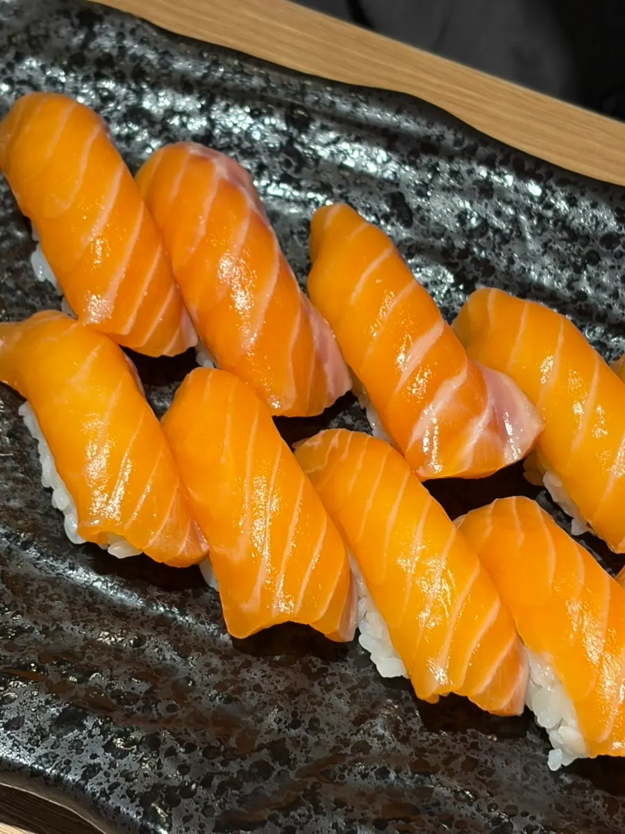 Close-up of chewy salmon sushi texture