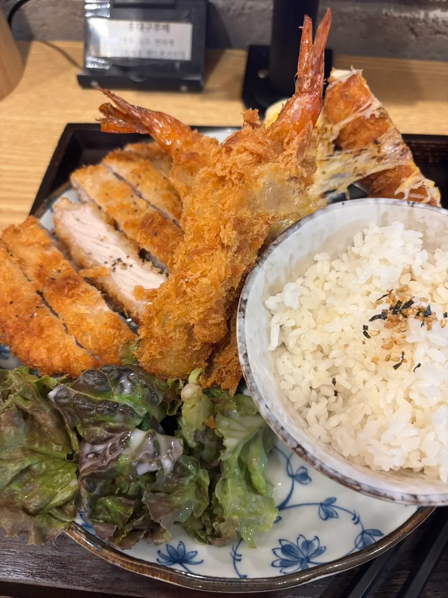Table set with mixed katsu platter and tako-yaki