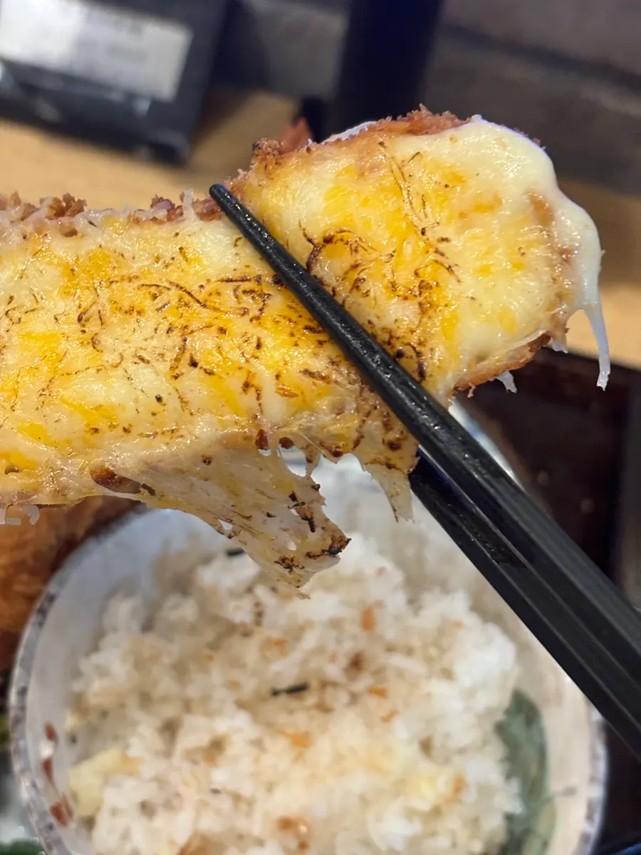 Cross-section of the cheese katsu showing melted cheese