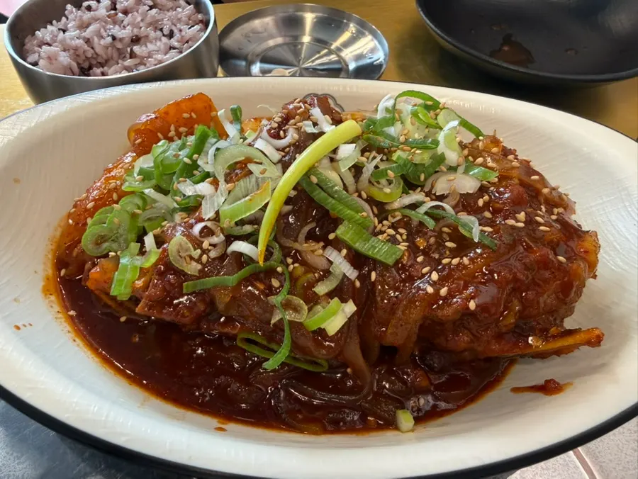 Bulppyeojjim served with flat glass noodles