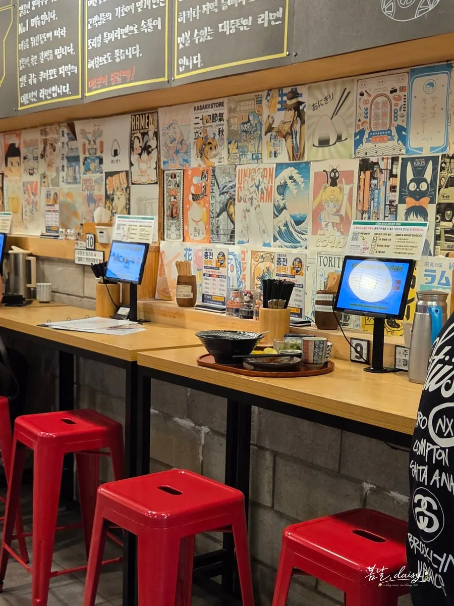 Restaurant with counter seats and tables