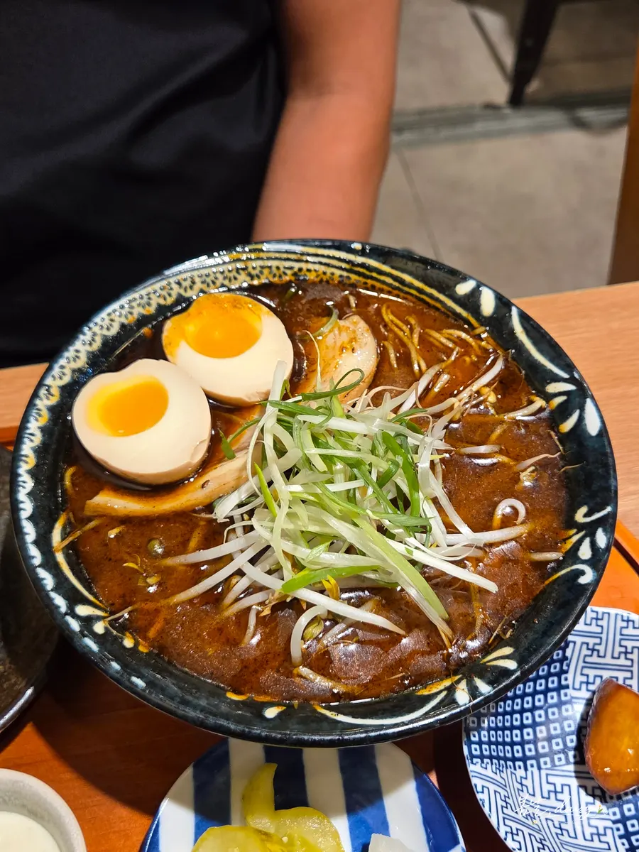 Spicy ramen broth with black garlic sauce