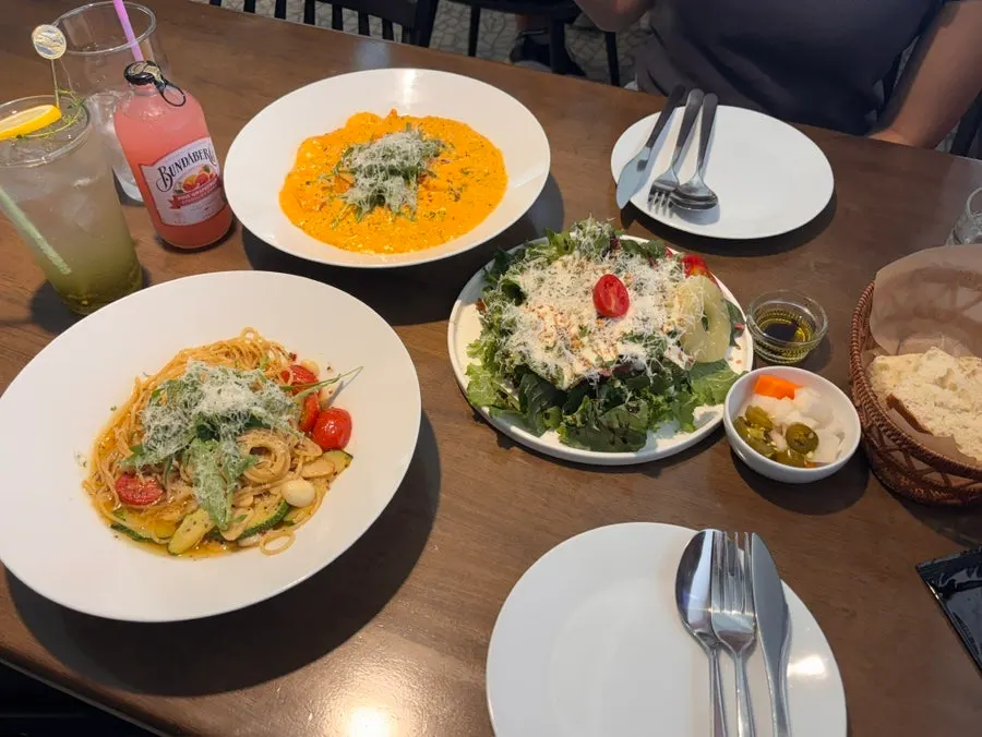Full spread of aglio e olio and risotto