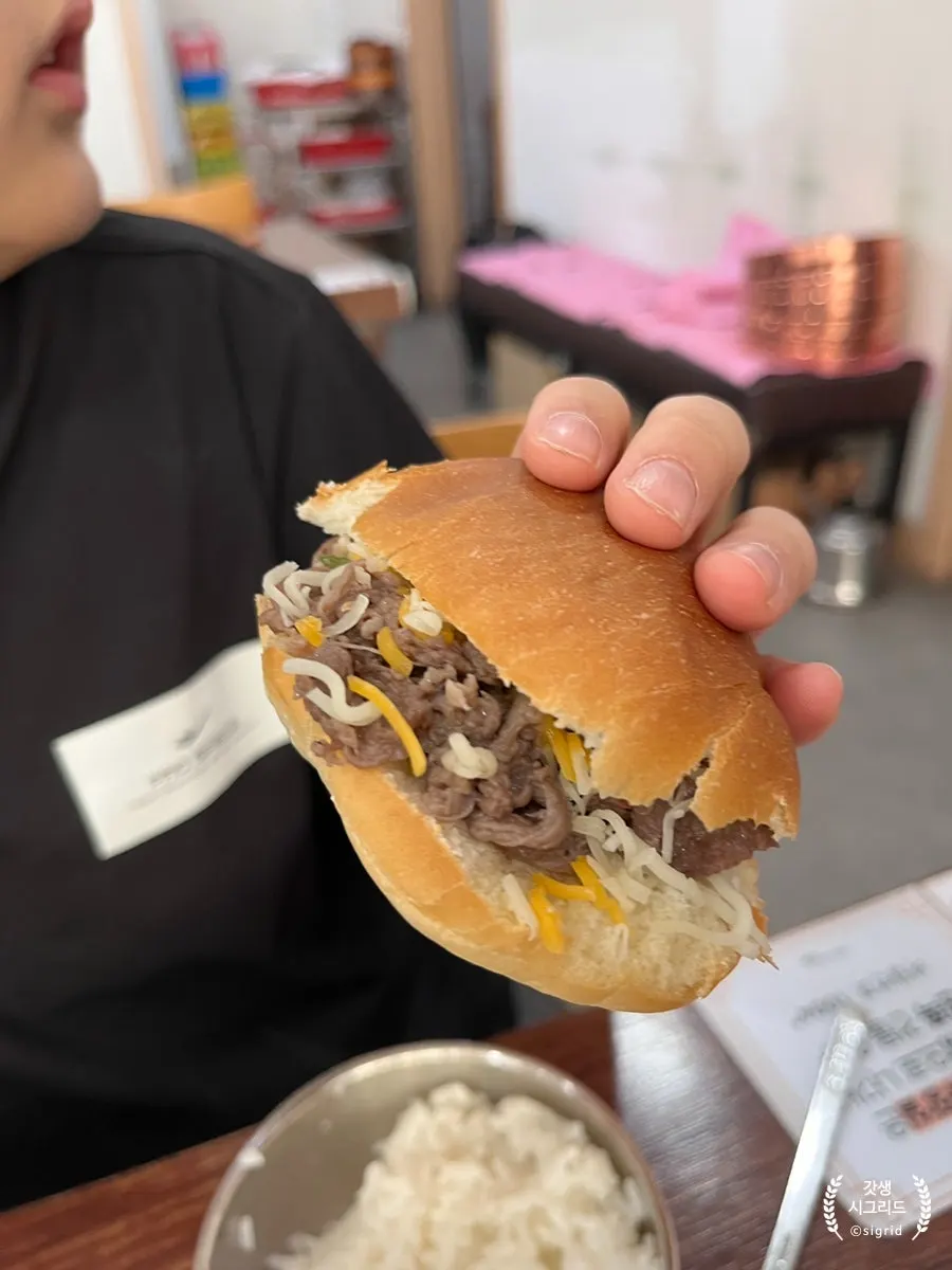 Homemade bulgogi burger being assembled