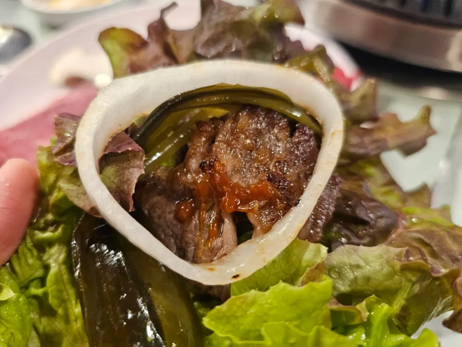 Wrapping hanwoo into a lettuce wrap