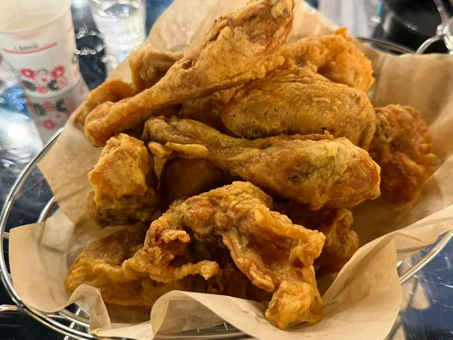 Fried chicken served on a large plate