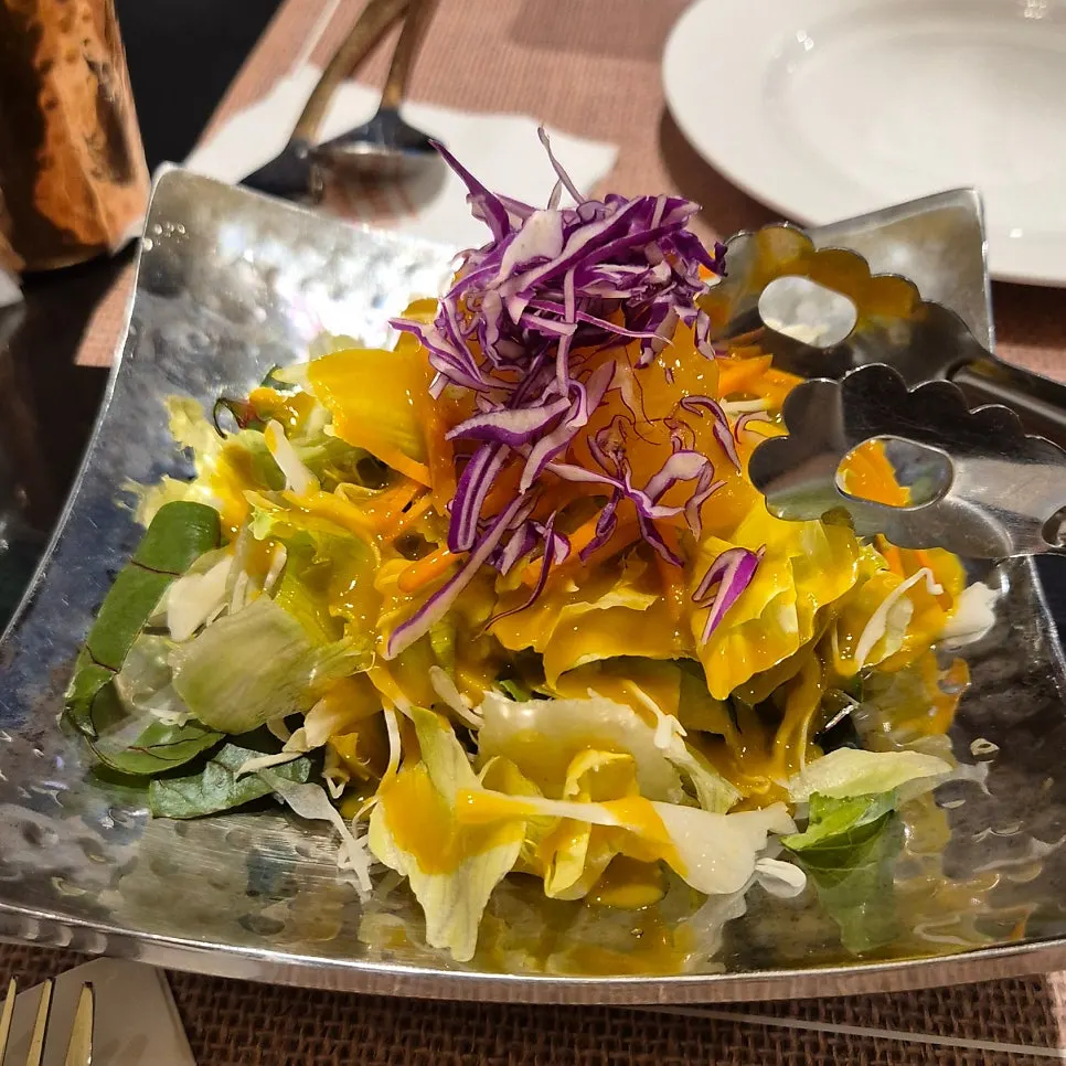 Green salad served first as part of Set B