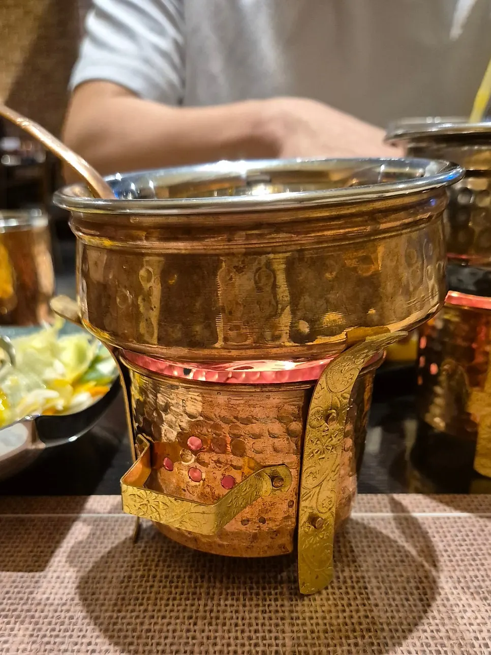 Curries kept warm on a tabletop warmer