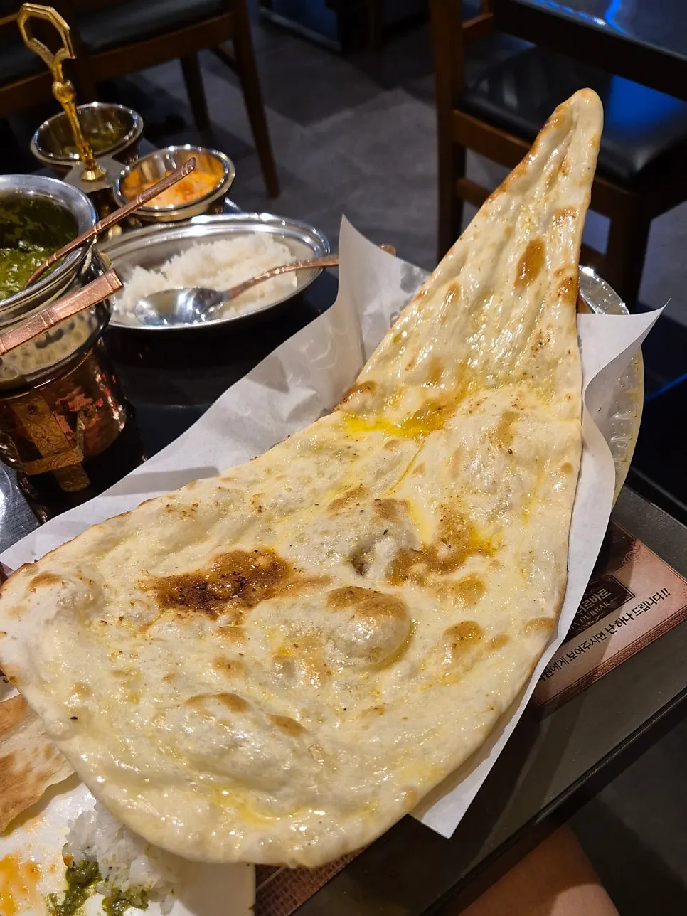 Freshly baked garlic naan
