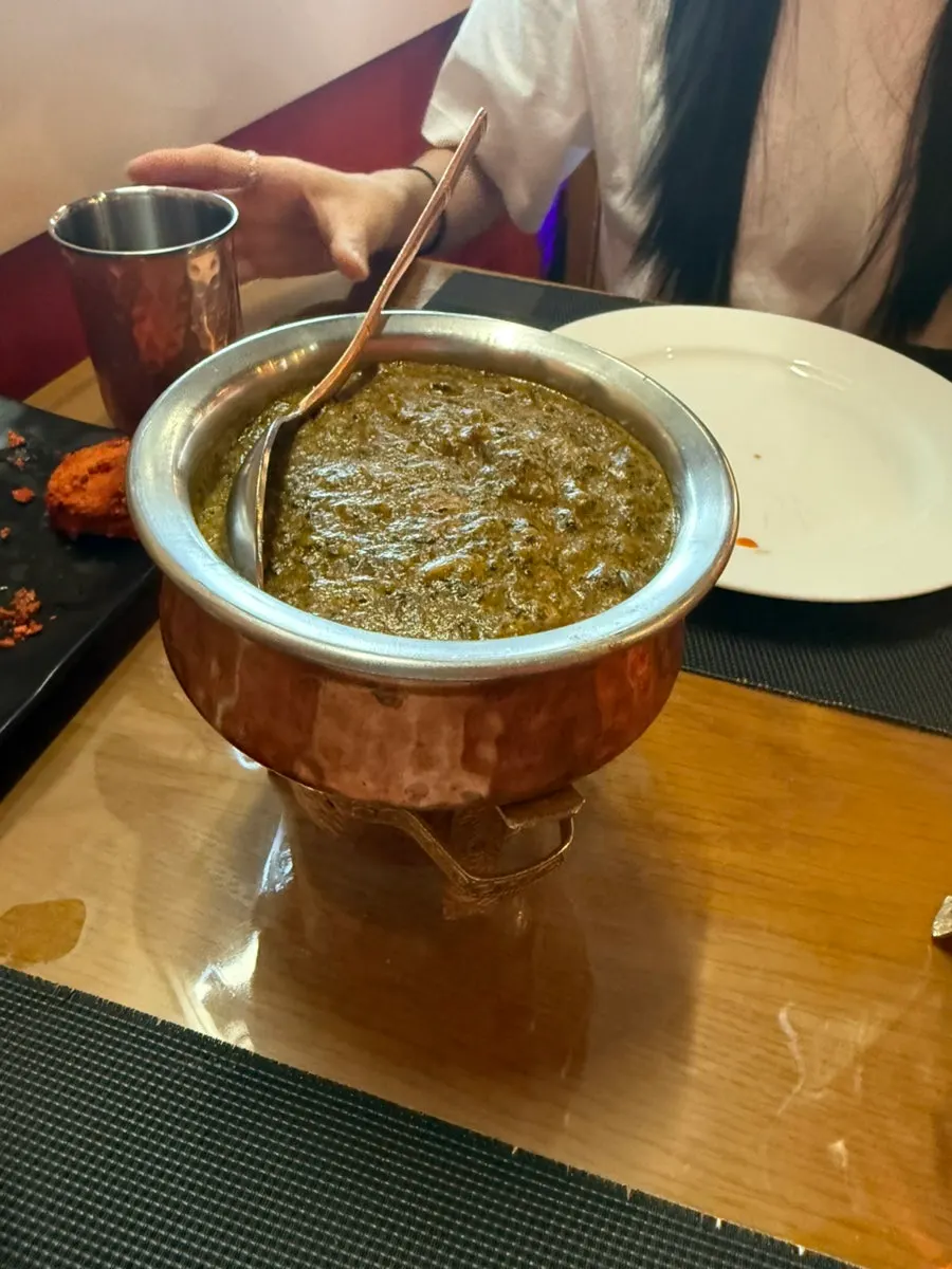 A rich plate of butter chicken curry