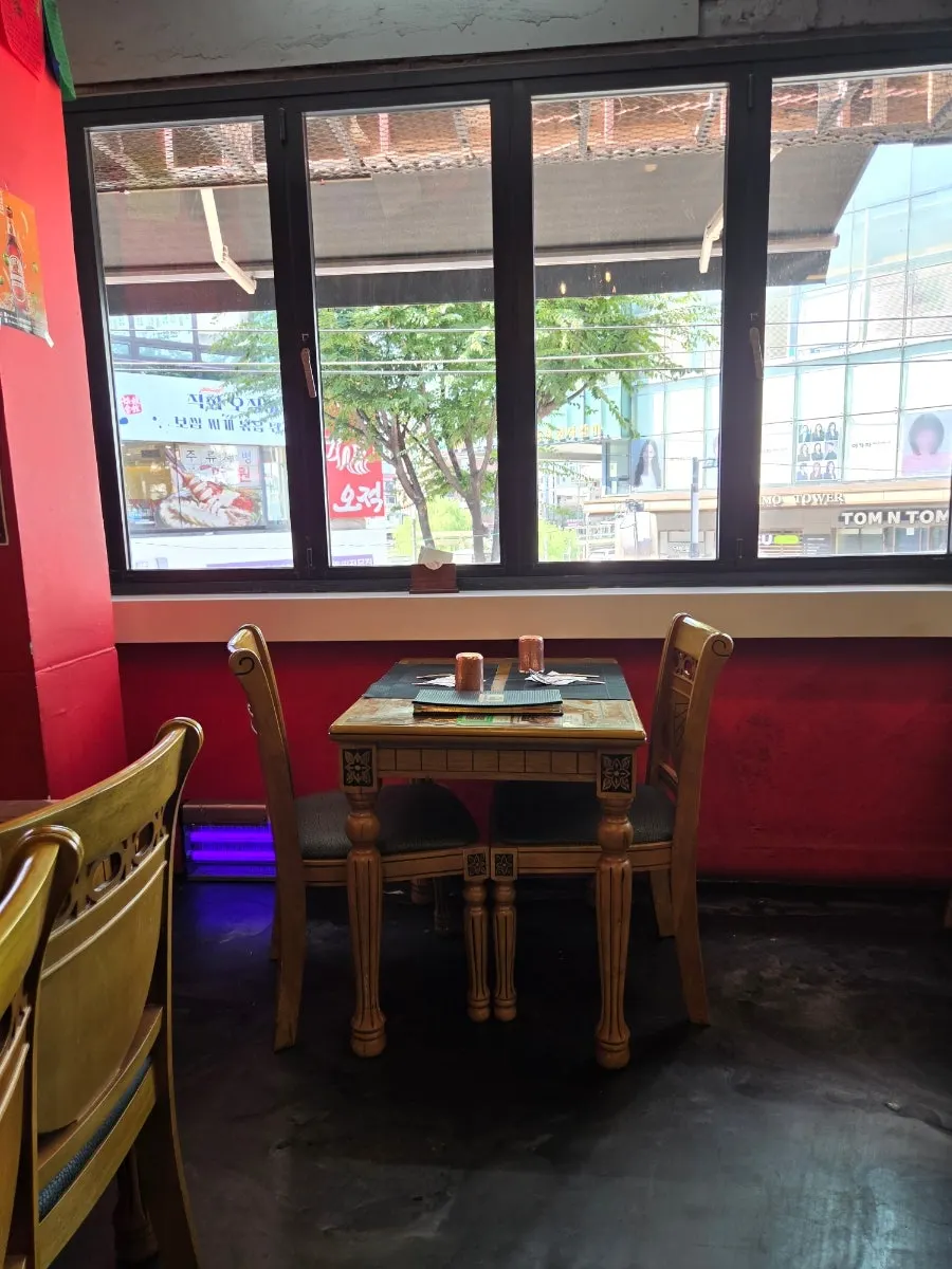 India Darbar interior decorated with red walls and local artwork