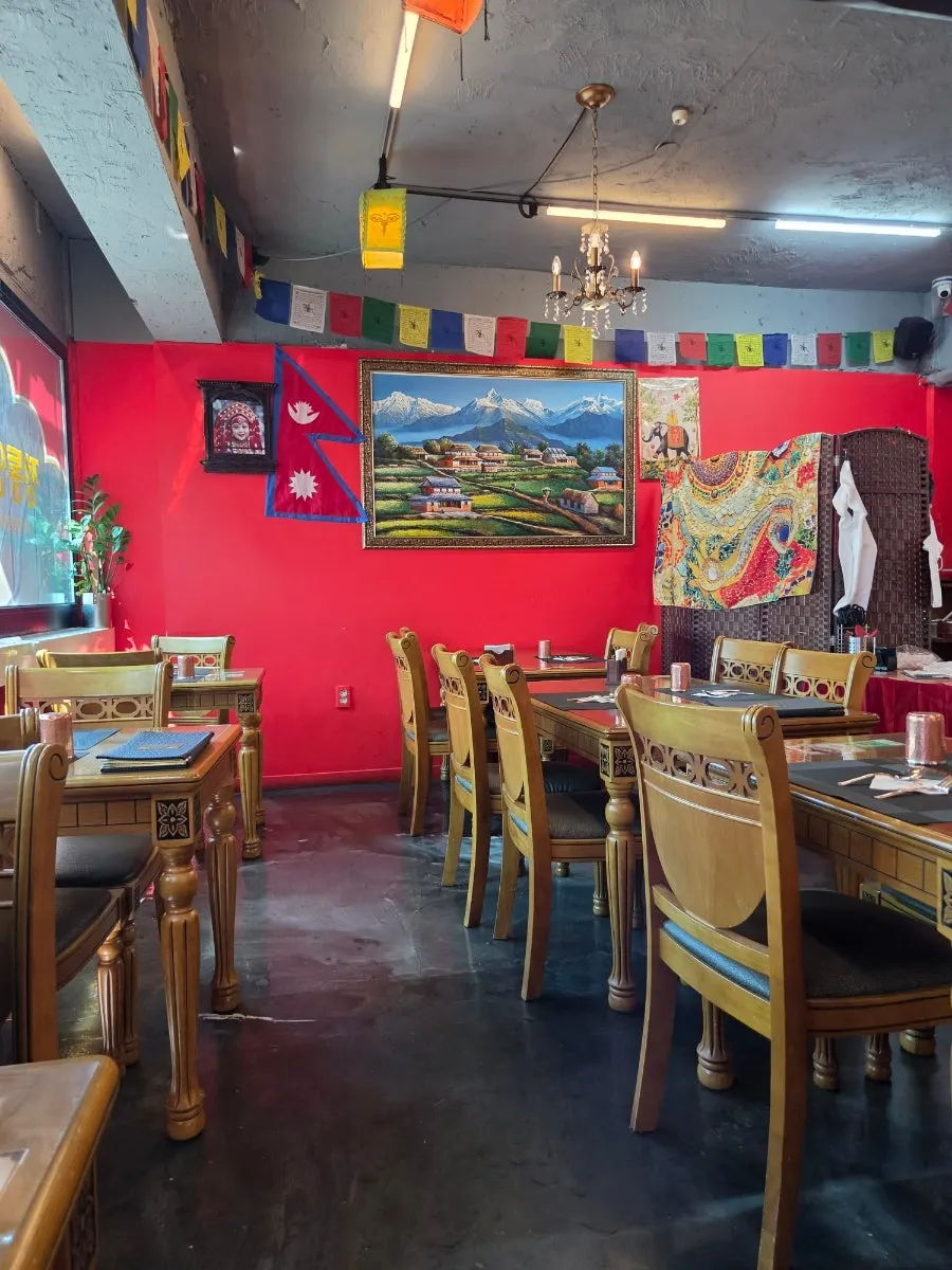 View of India Darbar's dining tables including window seats