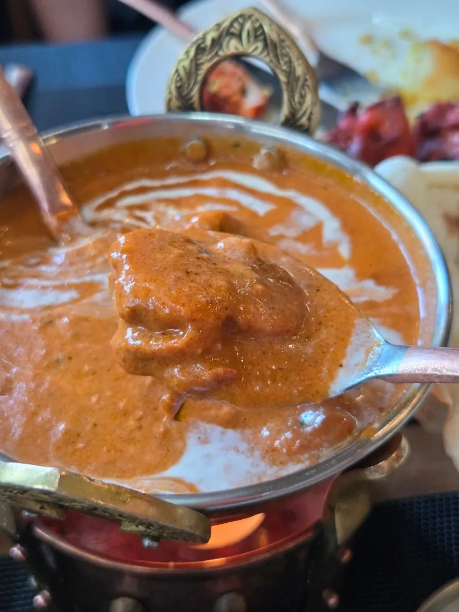 Butter curry and chicken served over rice