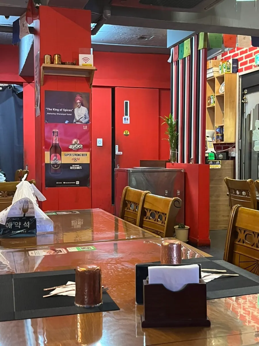 Spacious tables inside India Darbar
