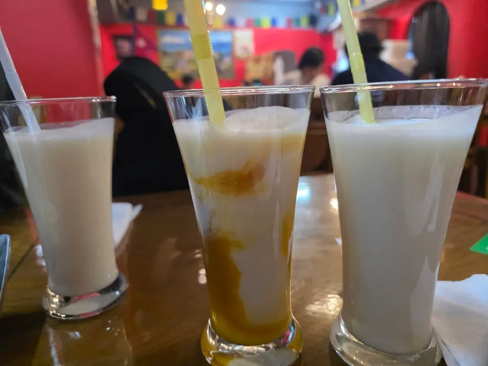 A glass of mango lassi added a la carte