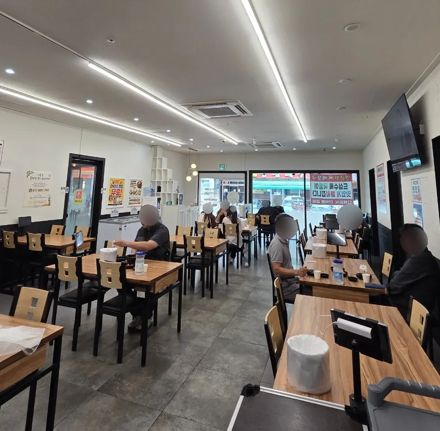 Interior of the restaurant with widely spaced tables
