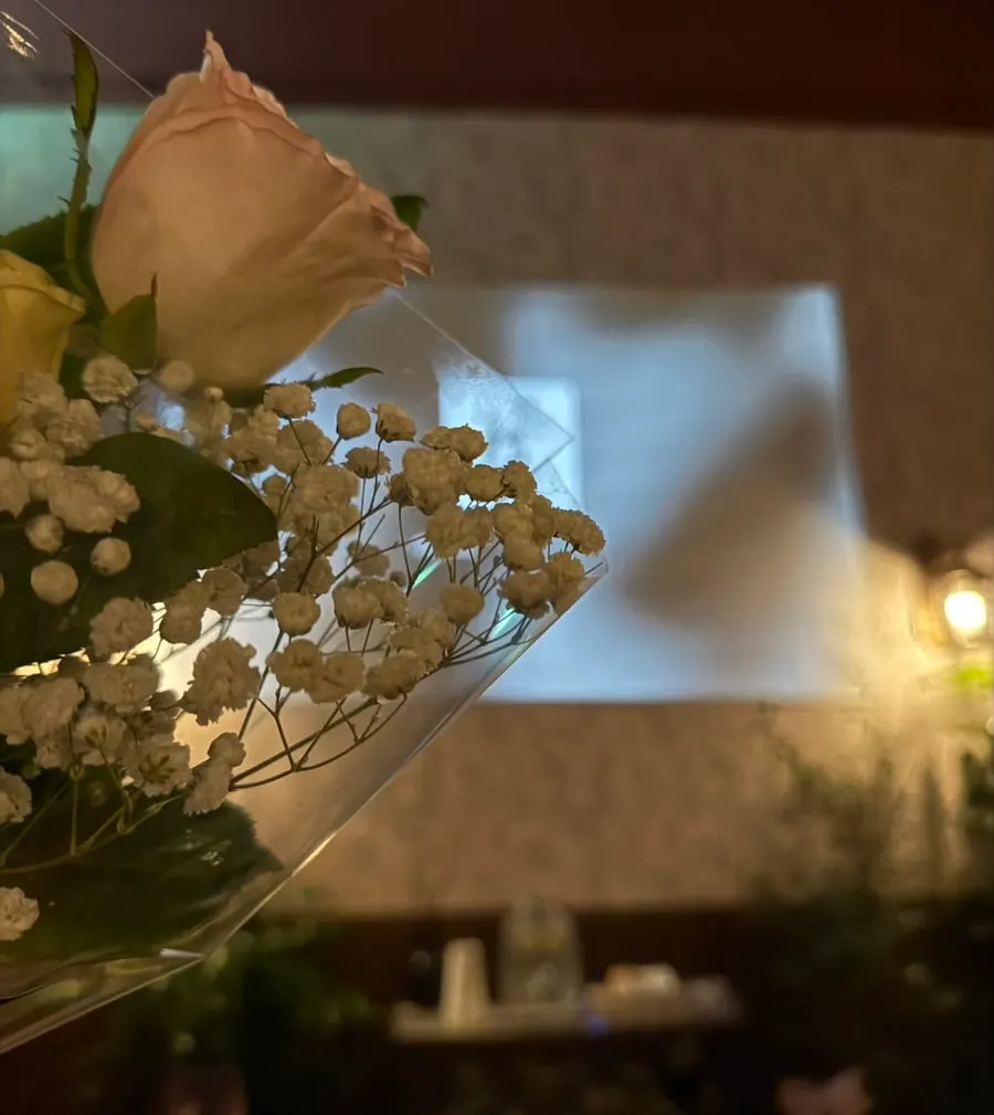 Bouquet bought at Haengridan-gil placed on a table at Janhyang