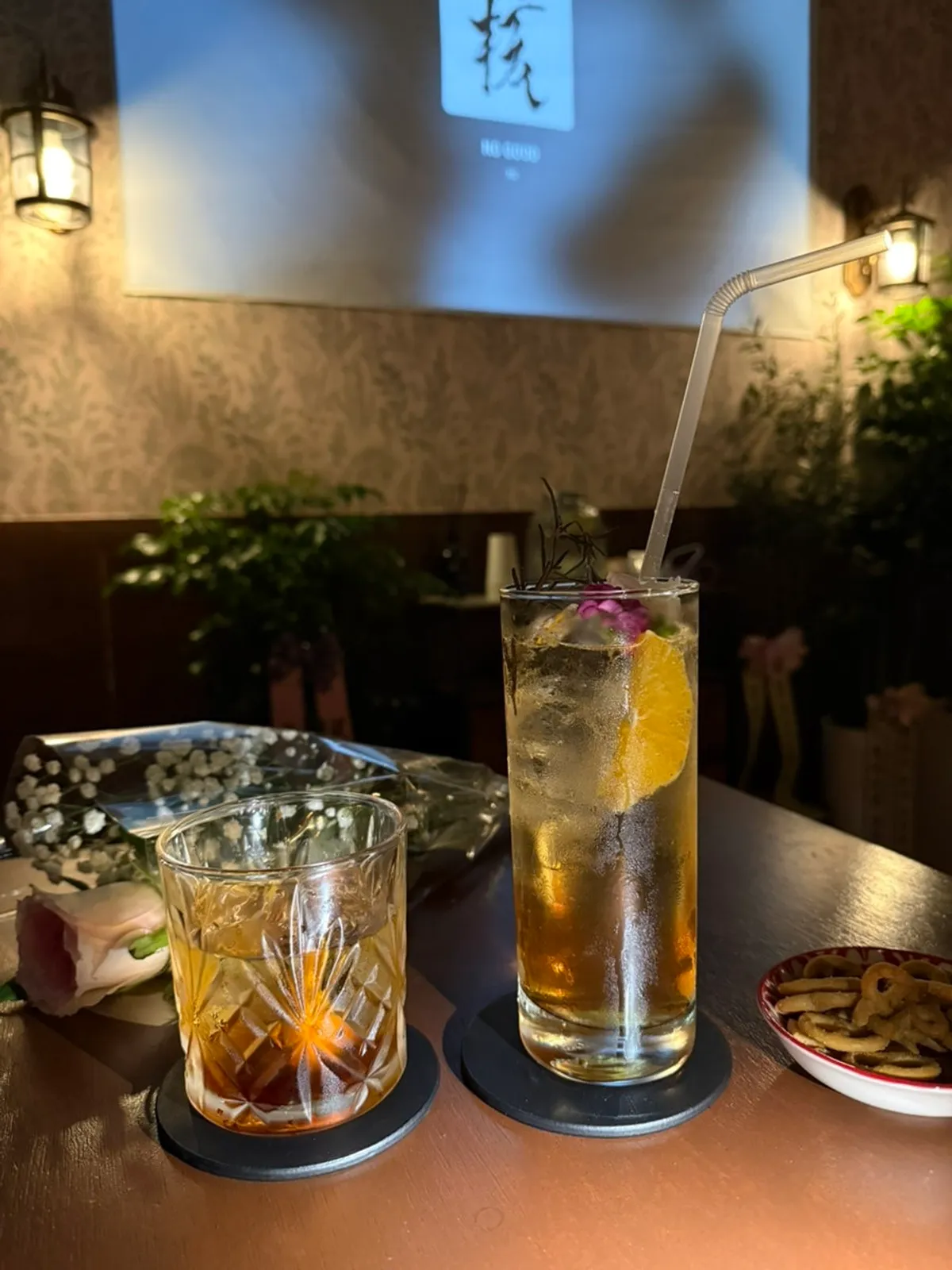 Two cocktails, Yeoun and Janhyang, with smoke rising from one