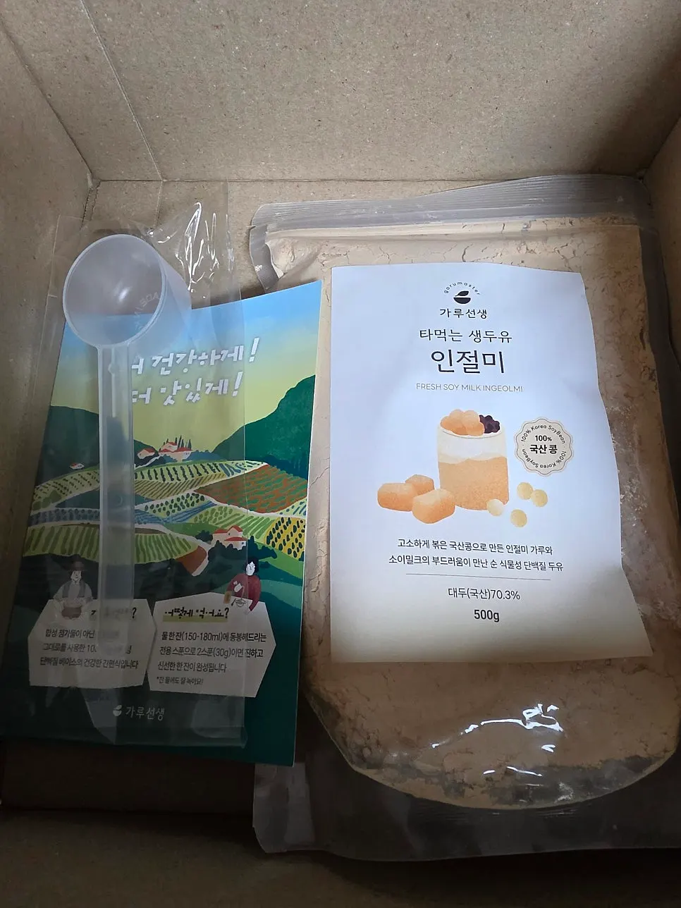 Opened delivery box with the soy milk powder packaging