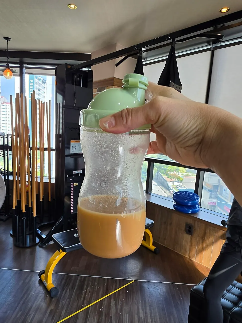 Drinking the injeolmi soy milk at the fitness center