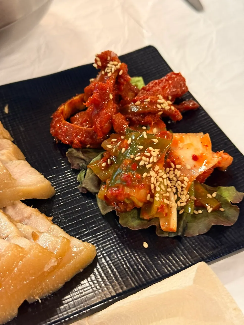 Makguksu noodles lifted with chopsticks