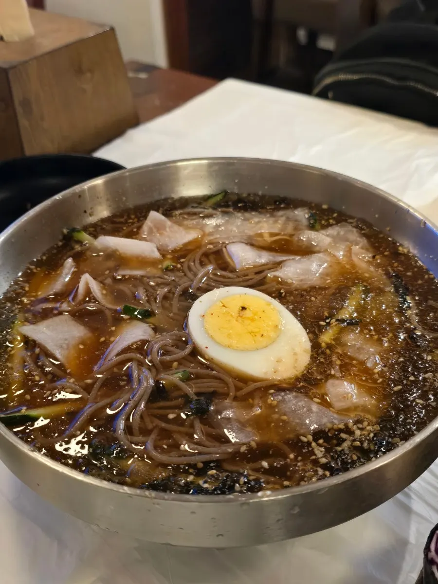 Mul-makguksu topped with radish