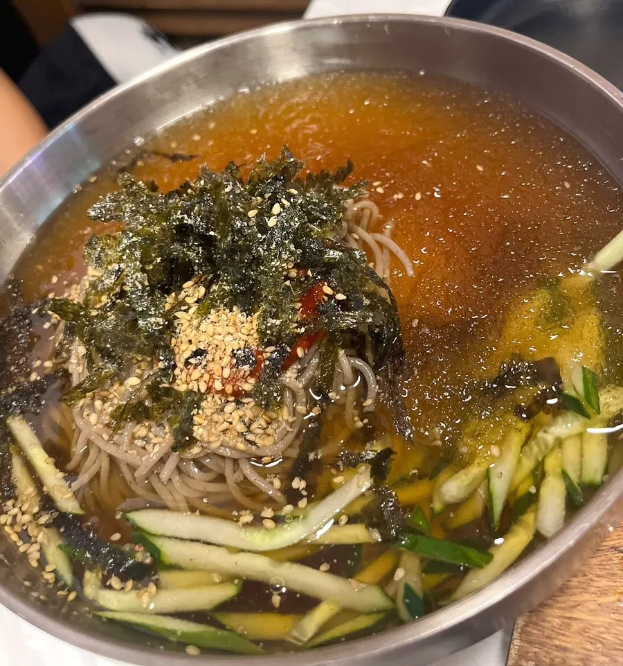Water makguksu with fine ice shards floating on top