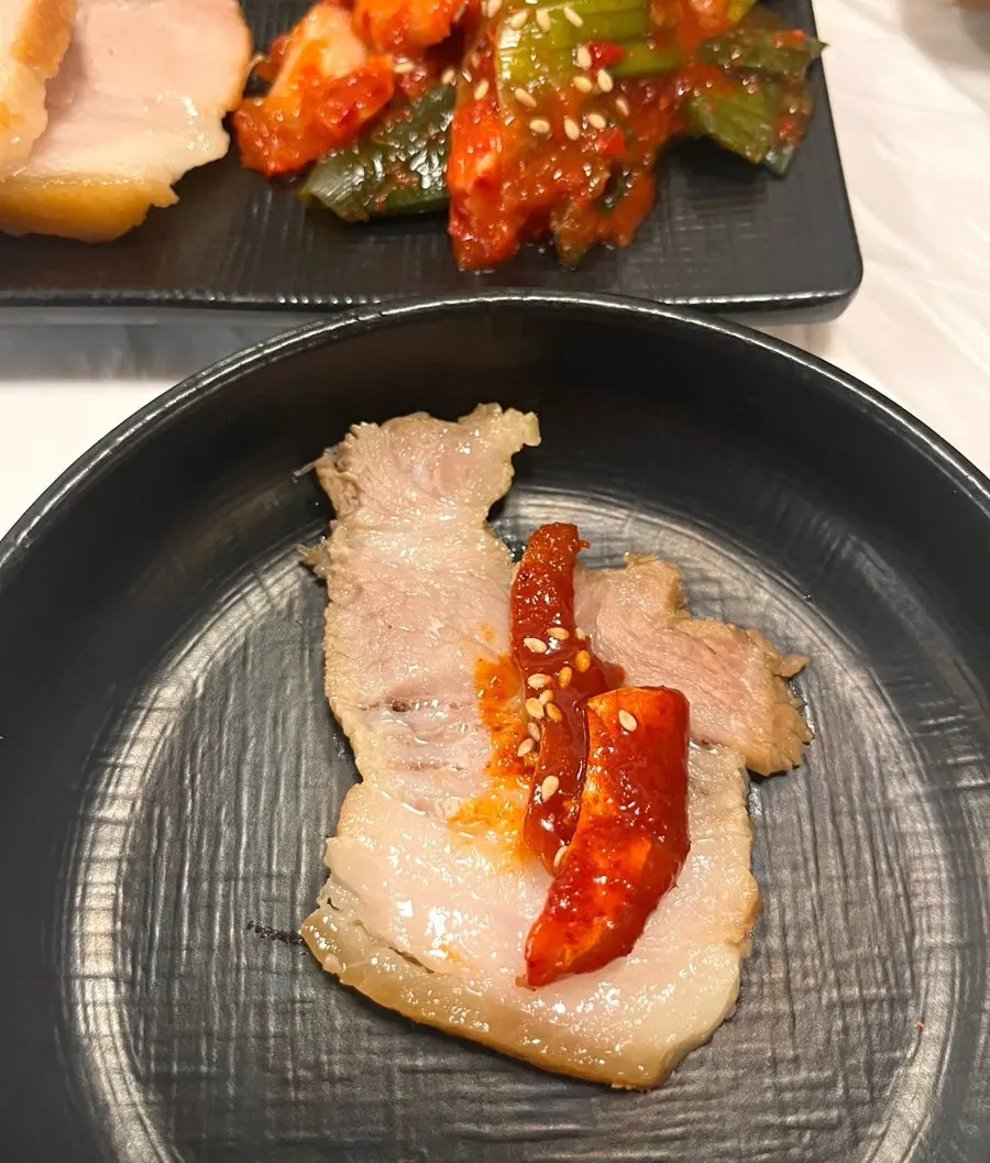 Bossam served with side dishes