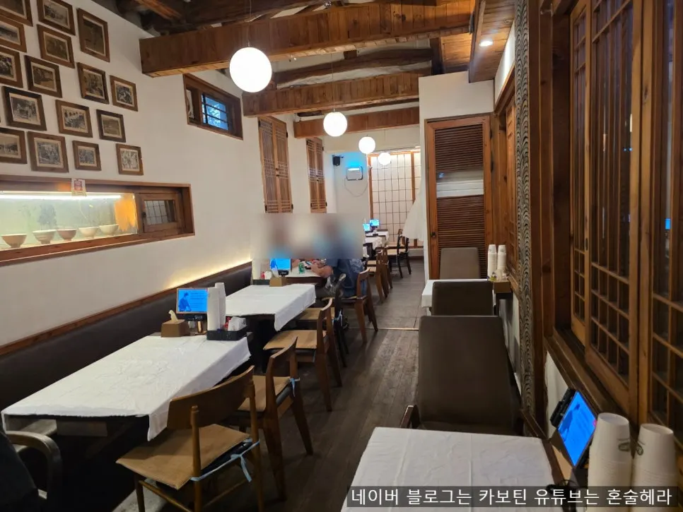 Table seating inside the hanok restaurant
