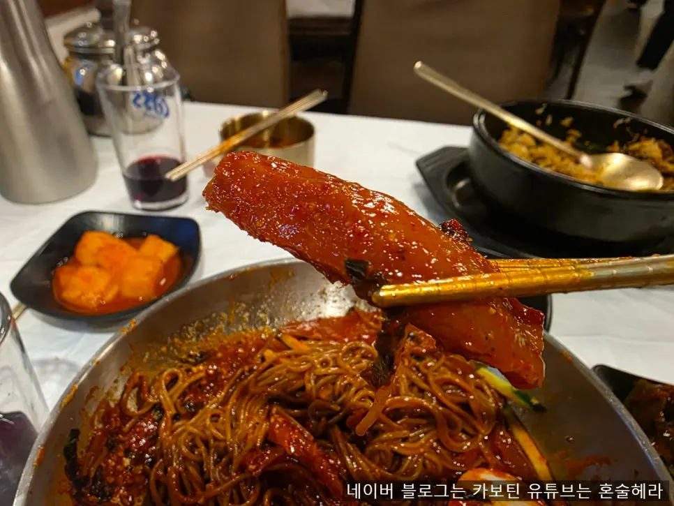 Bibim makguksu topped with pollock jeotgal seasoning