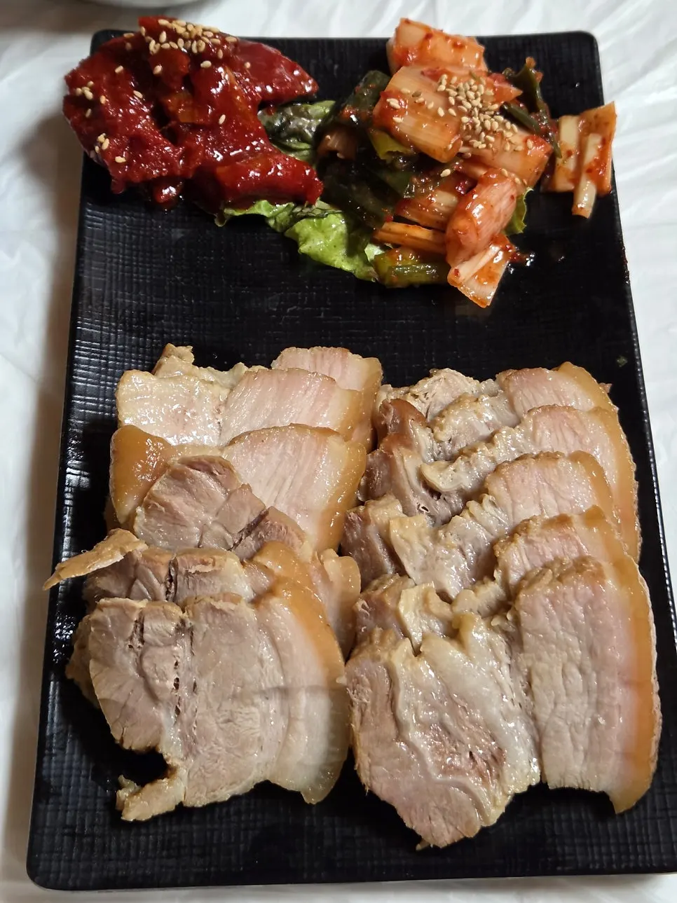 Plate of thickly sliced bossam