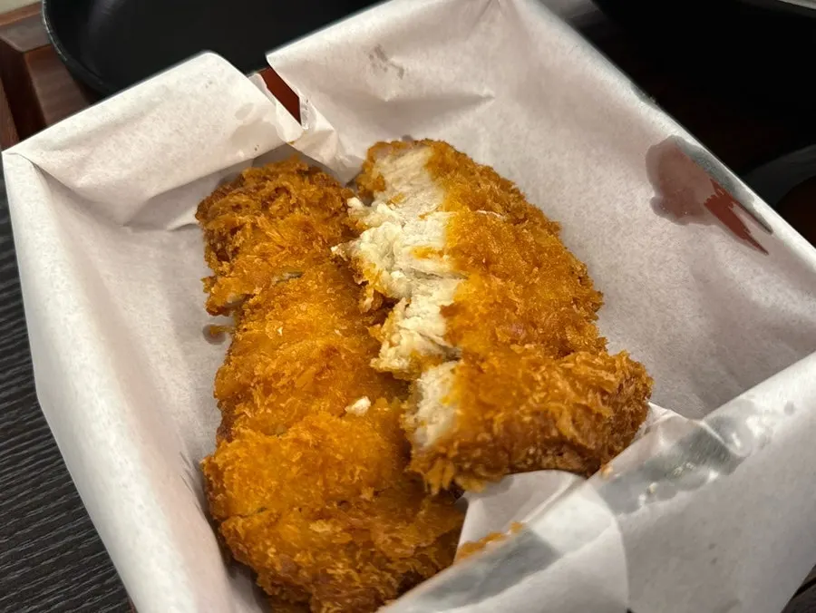 Close-up of a thick tonkatsu cutlet