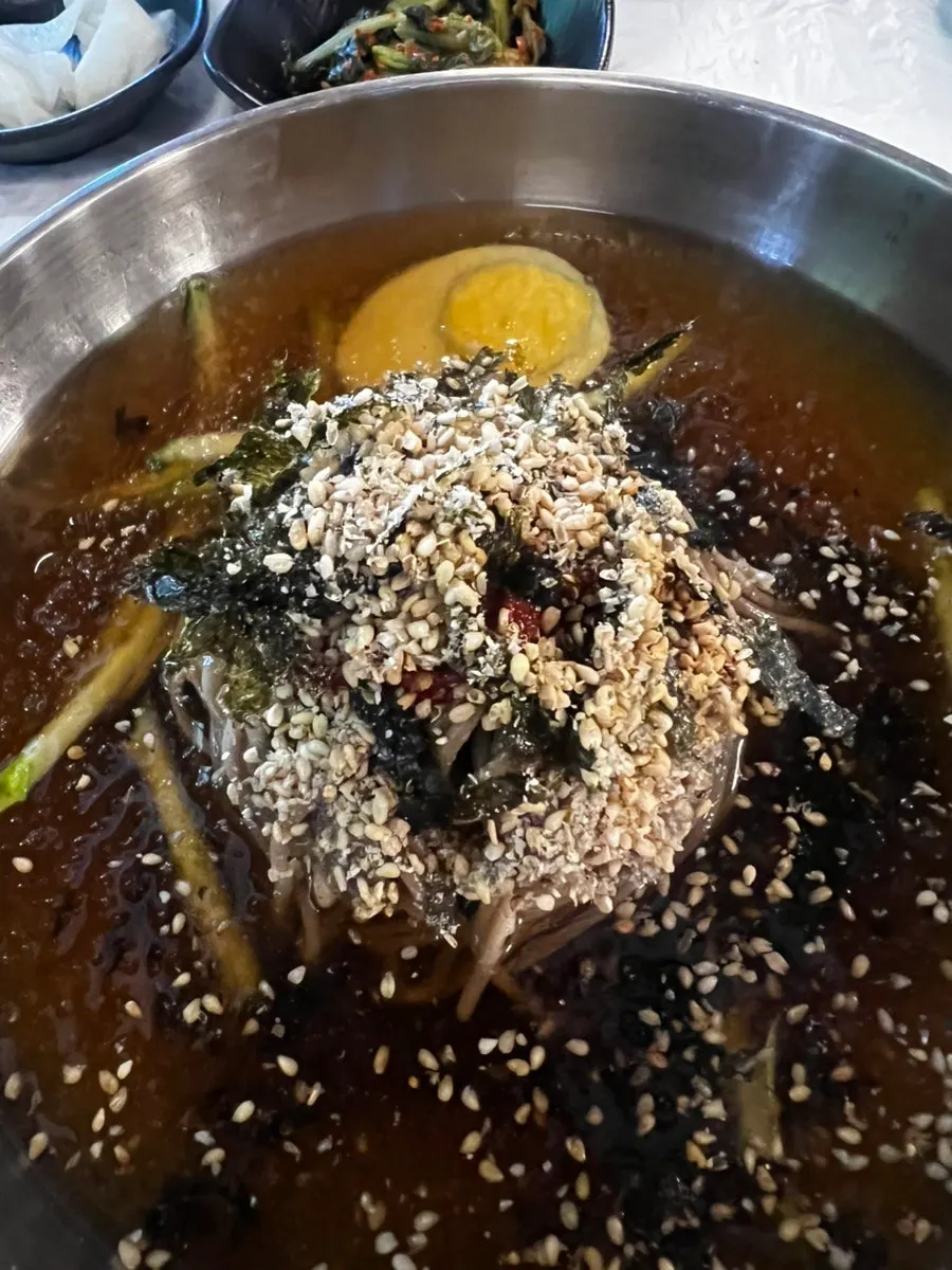 Water makguksu made with fresh-cut buckwheat noodles