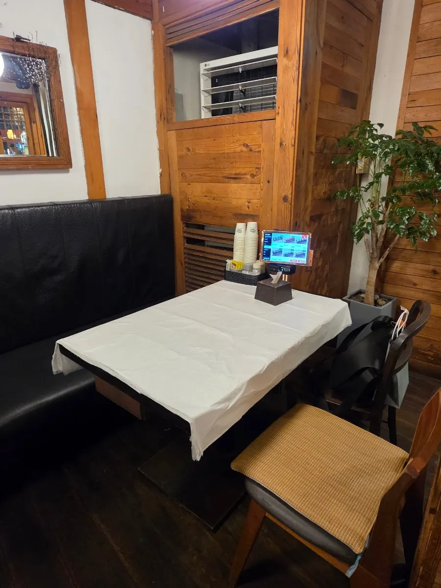 Spacious dining hall with 4-person tables