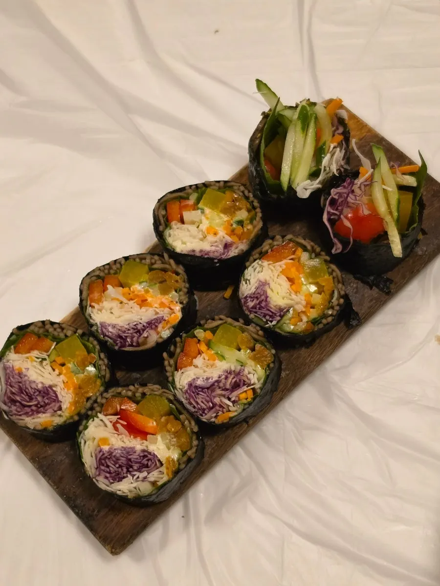 Cross-section of buckwheat gimbap packed with vegetables