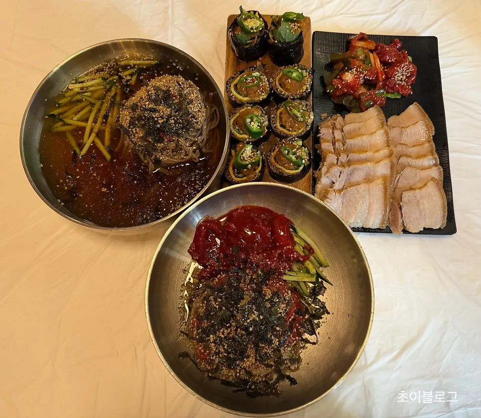 Self-serve side dish bar with kimchi, kkakdugi, and pickled onion